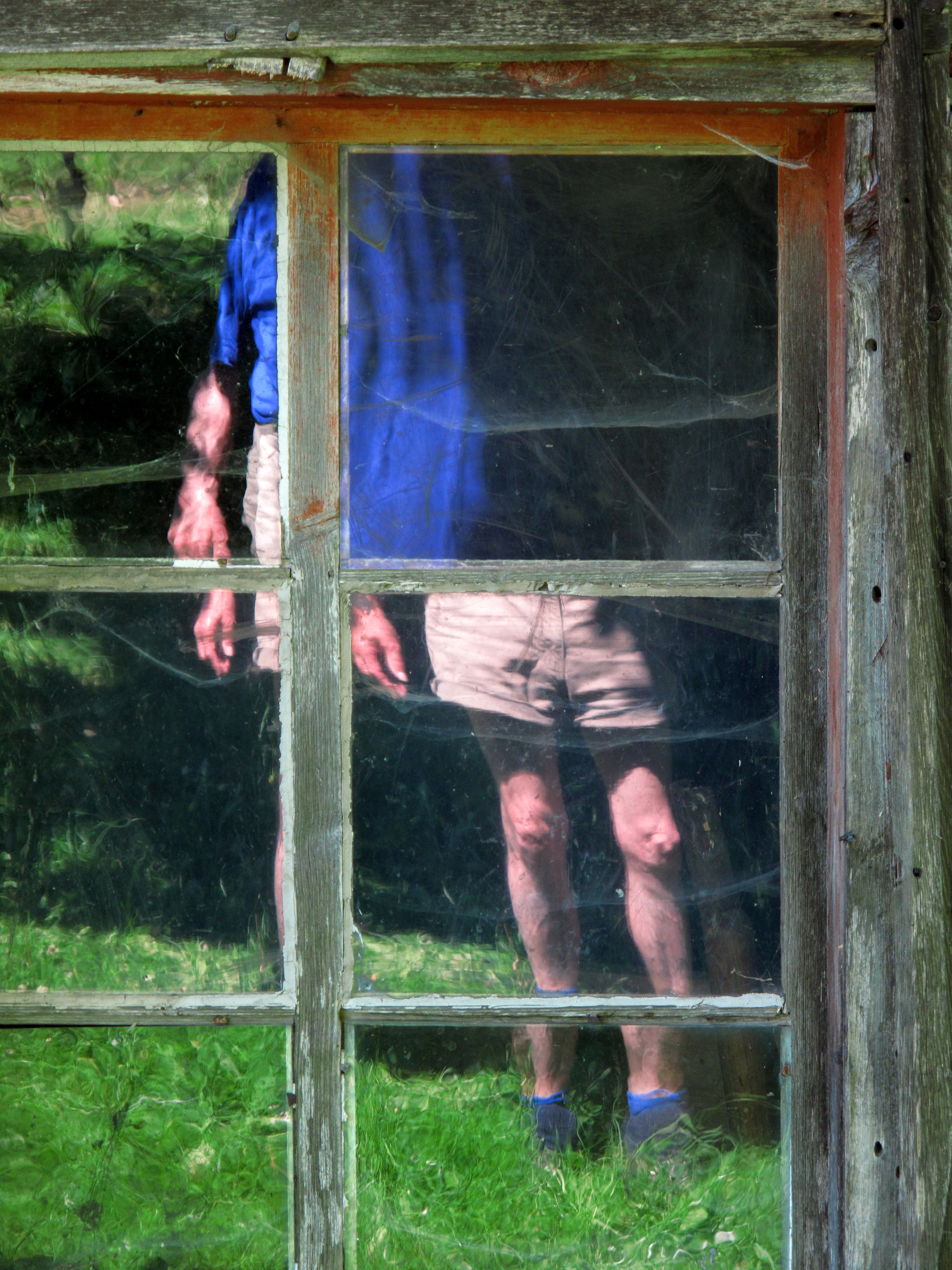 Self in old farm window